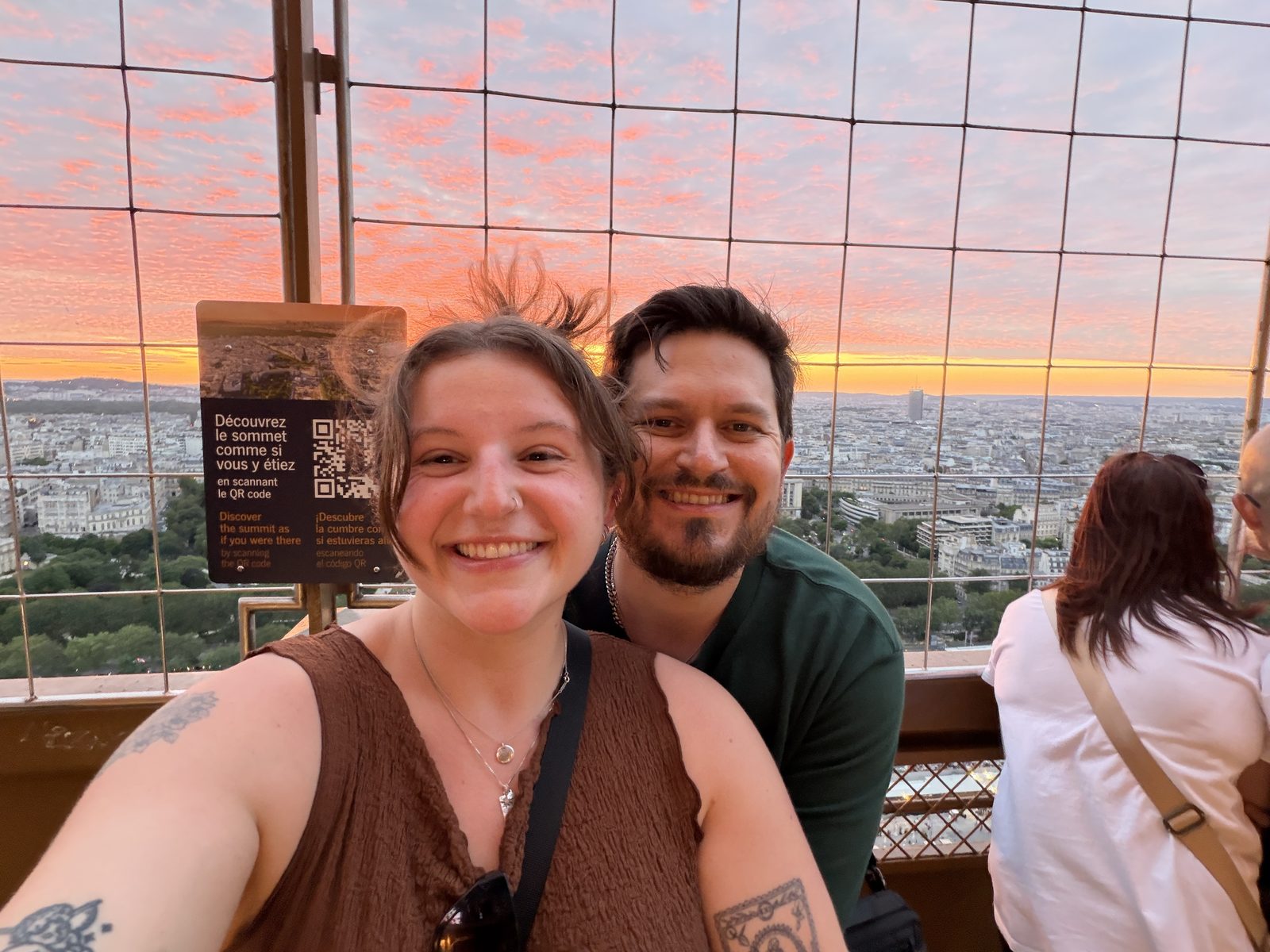 Cody and Laura at the top of the Eiffel Tower at sunset
